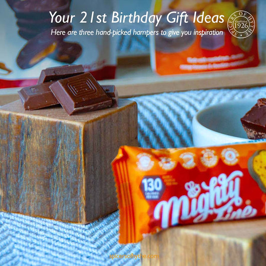 A 21st birthday gift ideas blog cover including chocolate gifts in the background.
